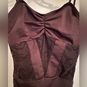 Capezio black patterned leotard size small.